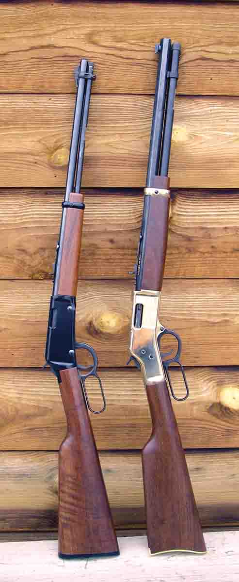 At left is a Henry Repeating Arms Company Lever Action .22 LR, and the Big Boy .45 Colt is at right.